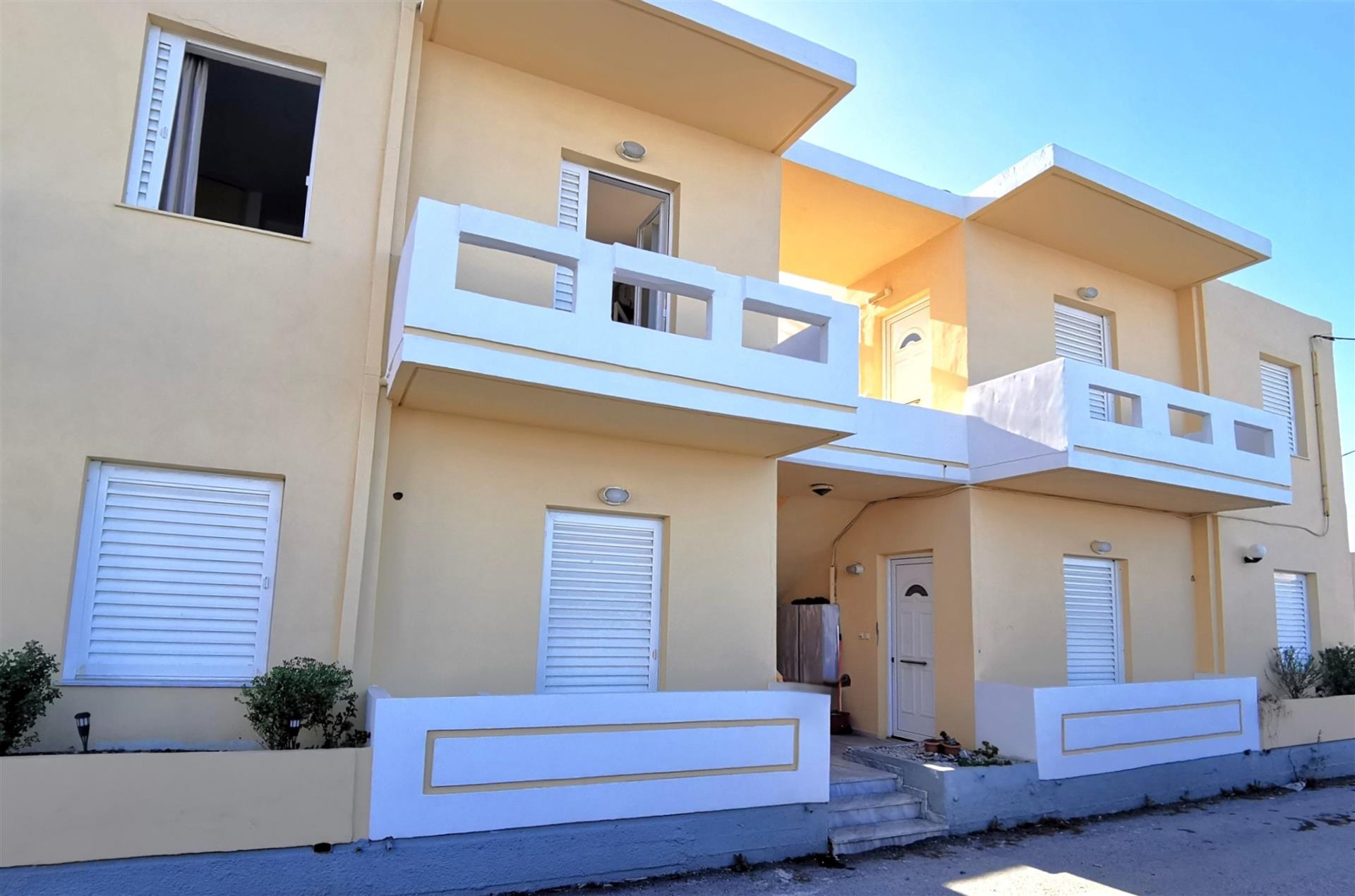 Building with four apartments facing the sea, near Kissamos, Crete 