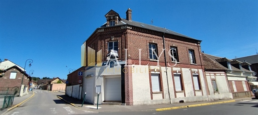 Costruzione con 6 camere e spazio commerciale di 226 m²