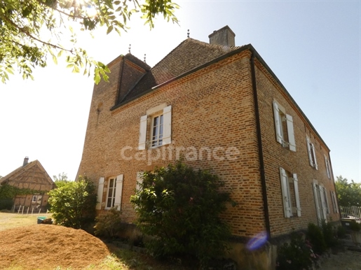Maison 13 pièces 395 m² · à Saint-Martin-en-Bresse · 395 m² · 660 000 €
