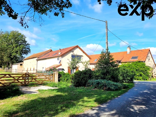 Maison 11 pièces 328 m² · à Sauvagny · 328 m² · 495 000 €
