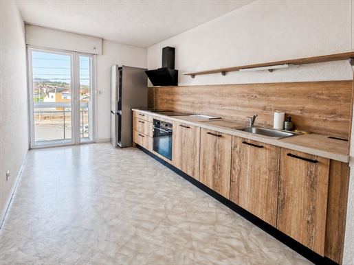 Beau 4 pièces de 84 m² avec garage, cave et balcons