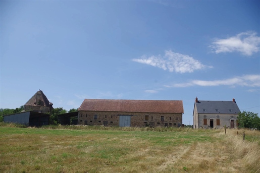 Maison 7 pièces 240 m² · à Dommartin · 240 m² · 195 000 €